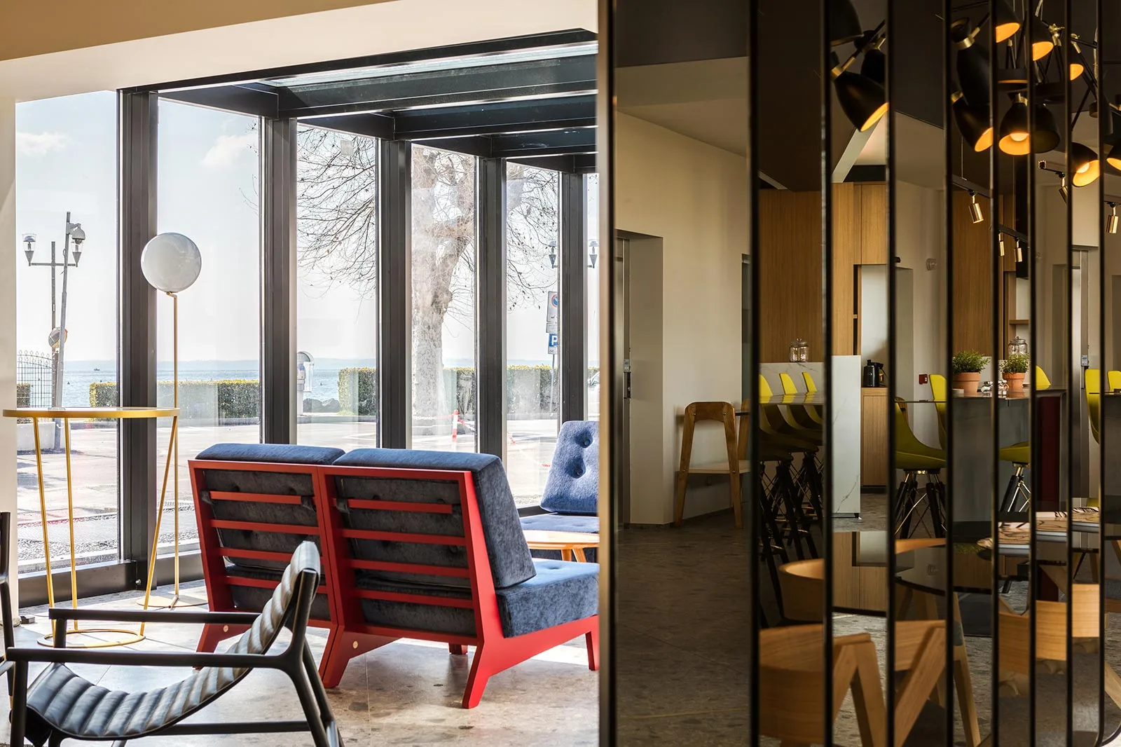 realizzazione management boutique hotel lago minimal spazi comuni