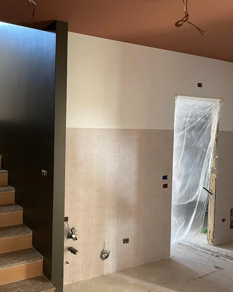 ristrutturazione hotel minimal neutro corridoio finiture scale